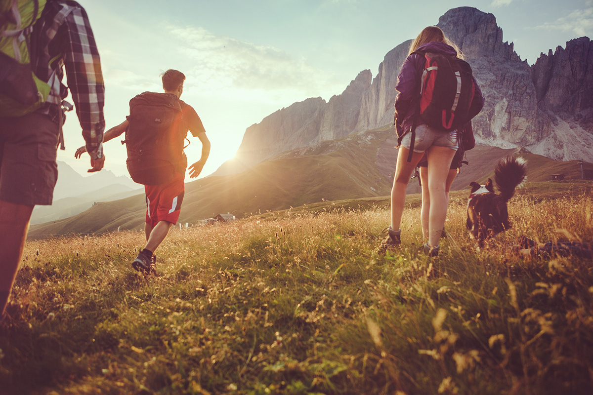 A group of teenage friends, together with a dog (border collie), adventures on the mountain, on the Italian Dolomites.